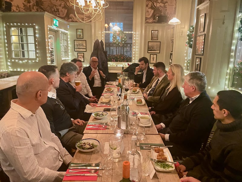 Readers in a private dining room somewhere in London