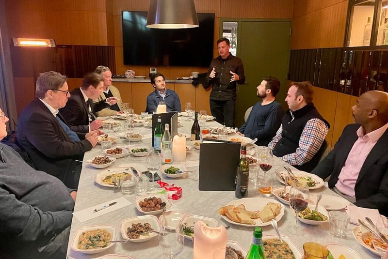 Adam Rossi speaking at the Best Ideas dinner in Washington DC